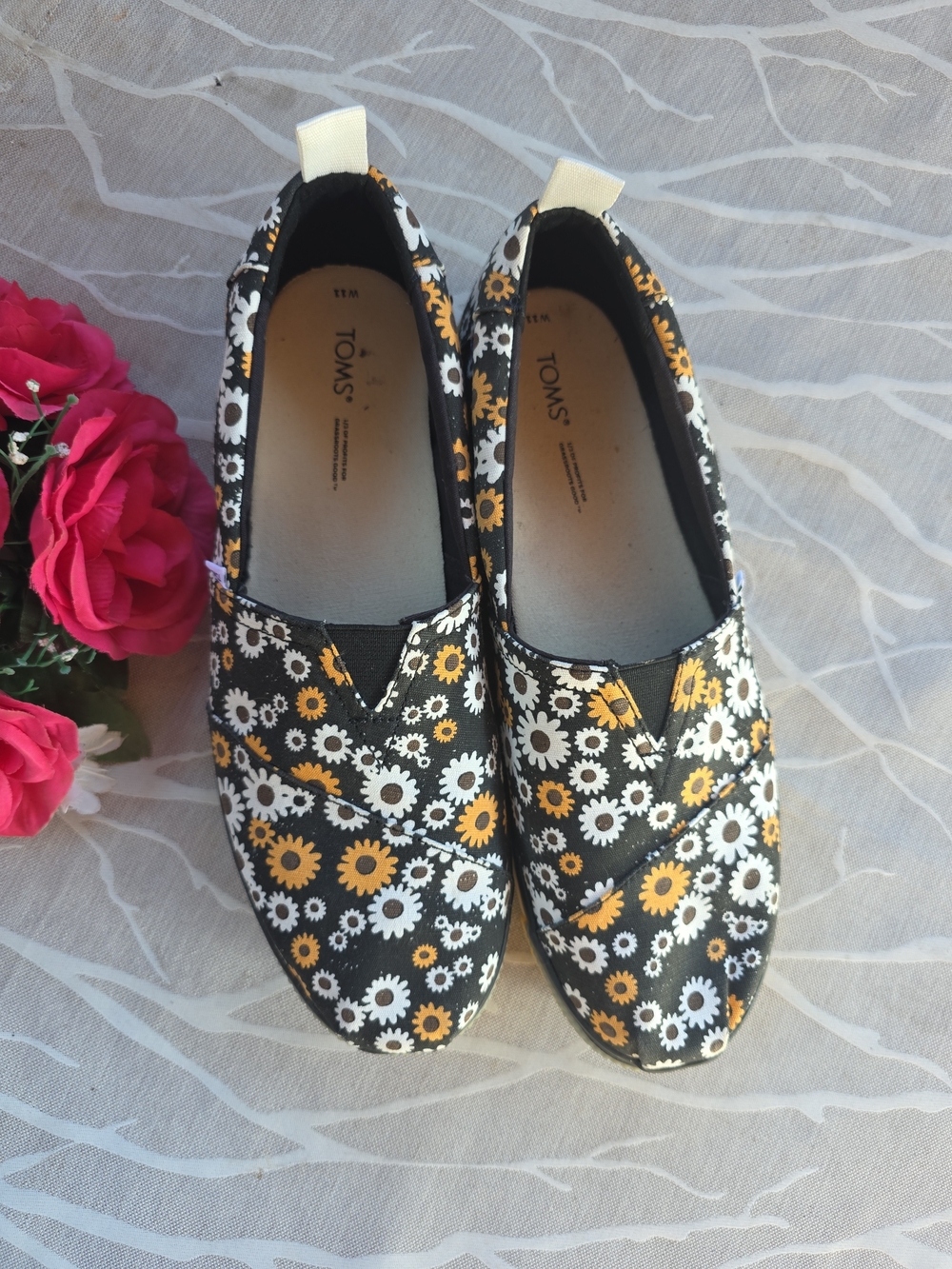 TOMS Women’s Slip-On Floral Canvas Shoes in Black and Yellow